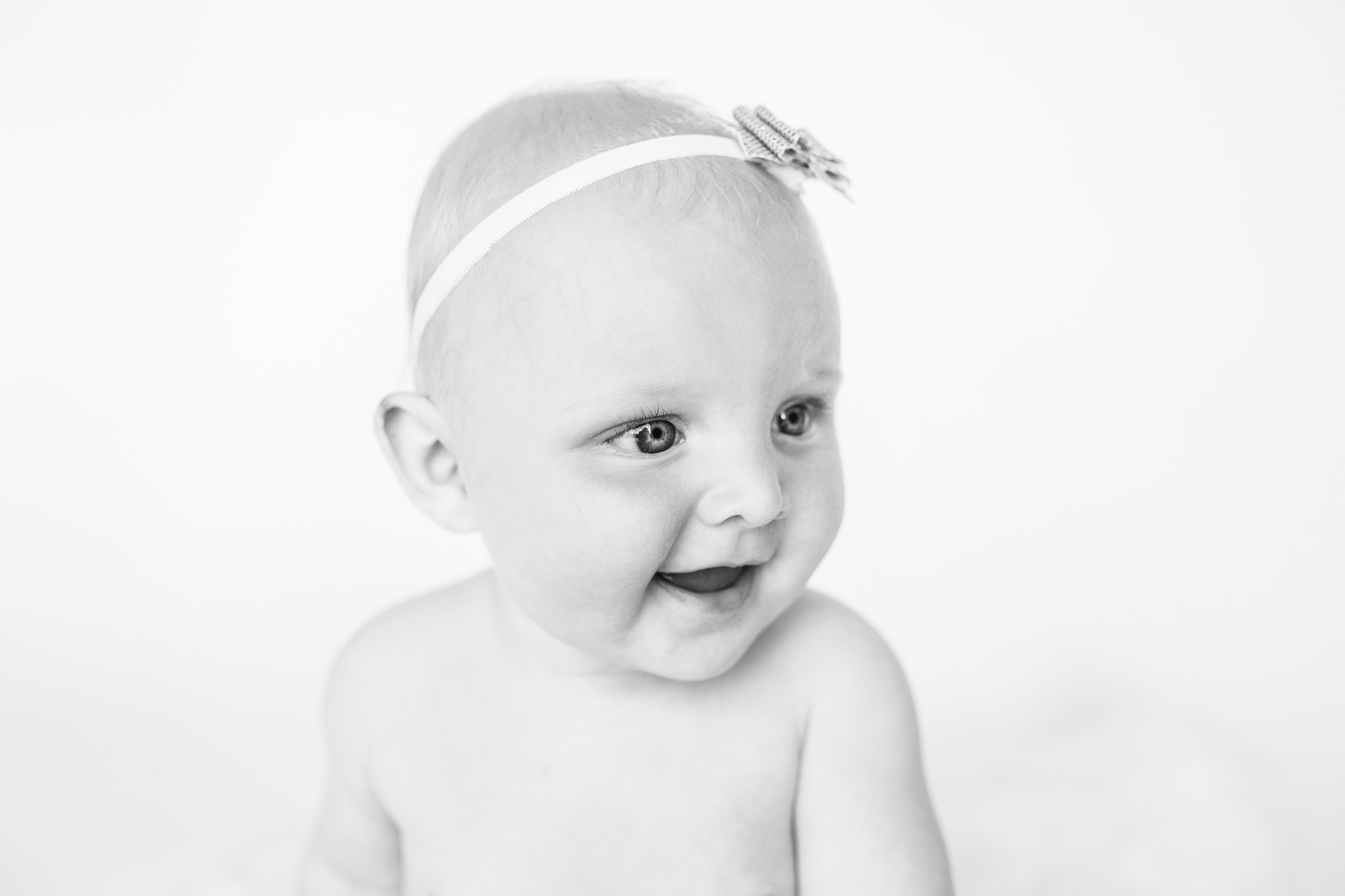 Black and white close up of child with headband - cake smash aberdeen - debbie dee photography