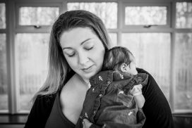 black and white image on mum snuggling newborn on shoulder - baby photos aberdeen - newborn photographer aberdeenshire - Debbie Dee Photography